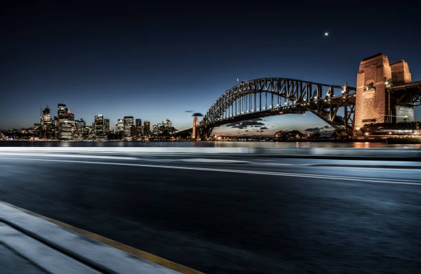 istock urban road by Sydney Harbor Bridge 1044631576