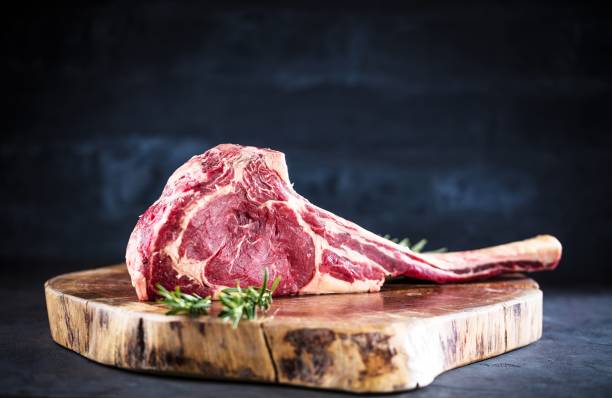 tomahawk steak grill - celebrity roast stock-fotos und bilder