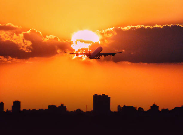 Airplane Departure Sunset Aircraft takeoff sunset Brazilian. guarulhos photos stock pictures, royalty-free photos & images