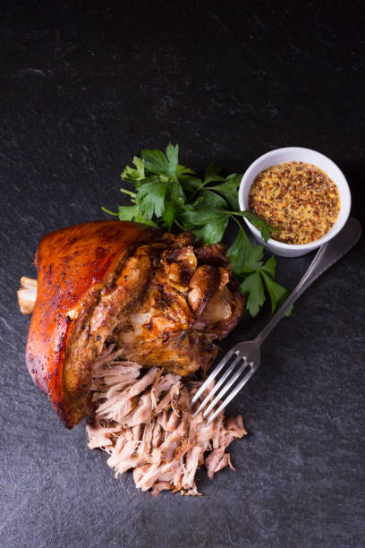 istock crispy fried Bavarian pork knuckle with soft meat 1044642818