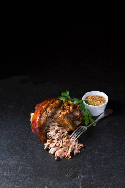 istock crispy fried Bavarian pork knuckle with soft meat 1044643062