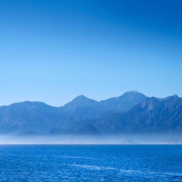 landscape image of high mountains over clear sky in Antalya, Turkey