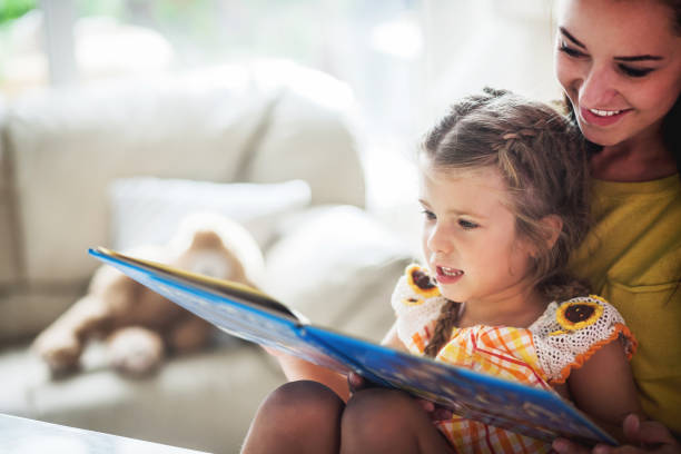 istock Mother And Daughter  Reading Book Together 1044646166