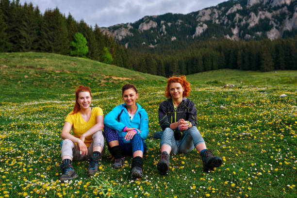 istock hiking friends relaxing 1044663636