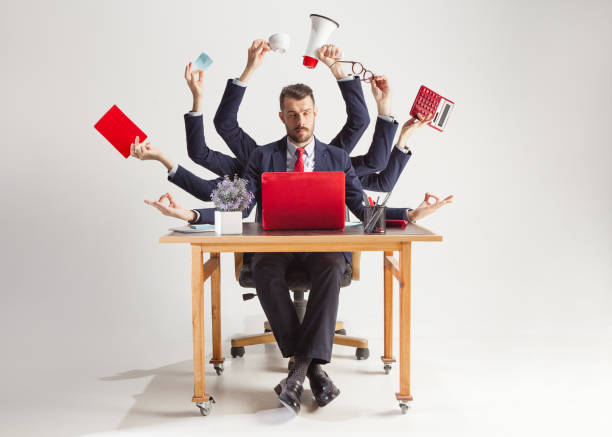businessman with many hands in elegant suit working with paper, document, contract, folder, business plan. businessman with many hands in elegant suit working and holding office tools. Isolated over white background. Concept of busy arm span stock pictures, royalty-free photos & images