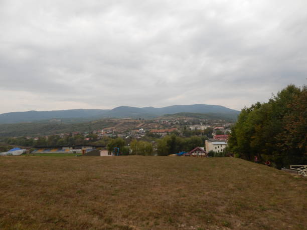 istock Mountain panorama, landscape and buildings 1044672146