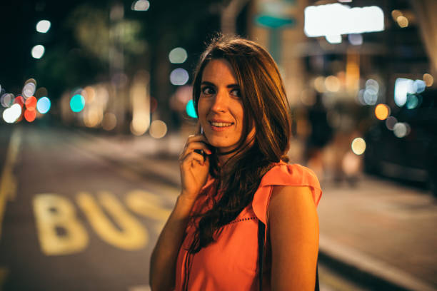 istock Elegant woman using cell phone outdoor 1044672462