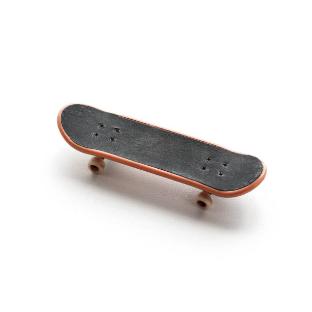 istock Fingerboard. A small skateboard. Close up. Isolated on white background. 1044675482