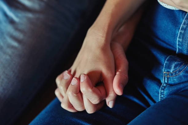 istock Your hand fits like a glove in mine 1044678194