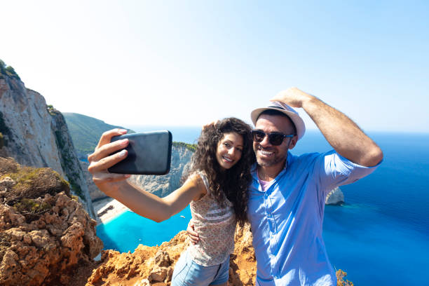 istock Couple taking selfie over Zakynthos island 1044686356