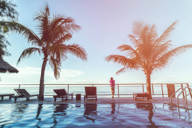 swimming pool and coconut tree at seaside in Vietnam