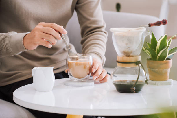 一杯のコーヒーから始まる新しい日 - breakfast bread table drop ストックフォトと画像