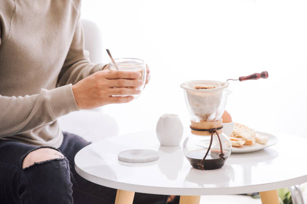 一杯のコーヒーから始まる新しい日 - breakfast bread table drop ストックフォトと画像