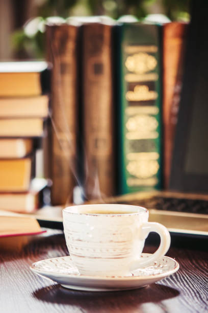 istock Coffee morning in the workplace. with a book or laptop. selective focus. 1044696692