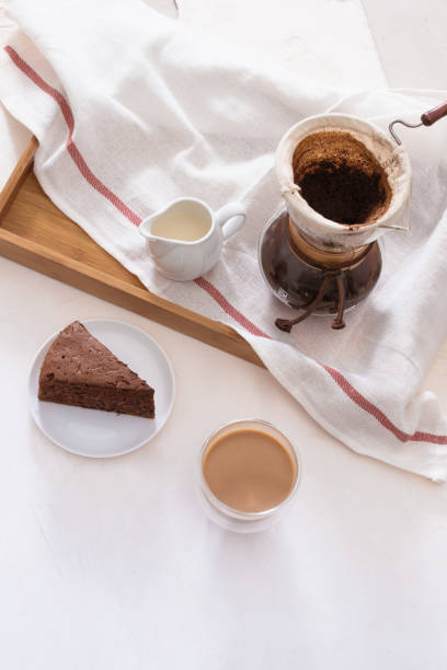 istock Breakfast with chocolate cake and coffee served on a beautiful living home 1044696776