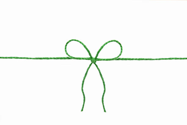 Green Rope with a bow on the middle isolated on a white background