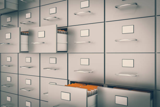 Filing cabinet with yellow folders in an open drawers Filing cabinet with yellow folders in an open drawers - data collection concept. 3D rendered illustration. archival stock pictures, royalty-free photos & images