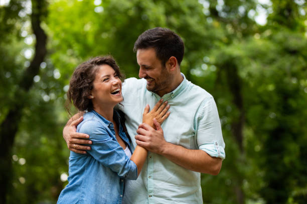 istock Couple in love spending time in the park 1044703516