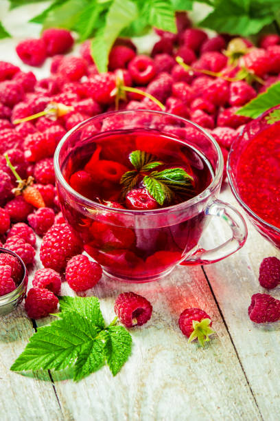 istock Raspberries on a wooden background. Selective focus. 1044704126