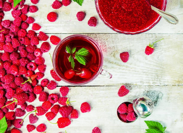 istock Raspberries on a wooden background. Selective focus. 1044704148