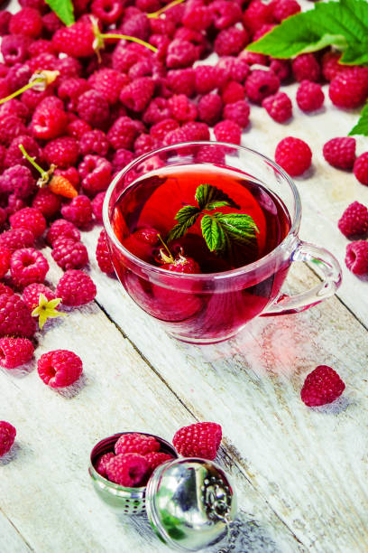 istock Raspberries on a wooden background. Selective focus. 1044704182