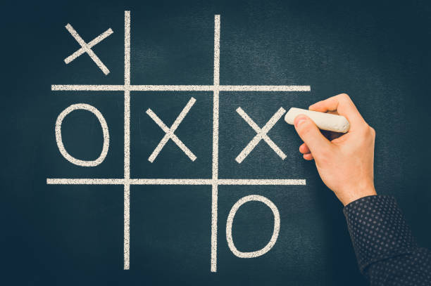 istock Tic-tac-toe game on blackboard 1044704226