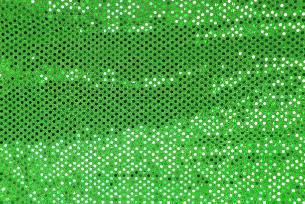 istock Sparkling green sequin textile background, fabric, sequins on fabric, fabric embroidered sequins 1044710868