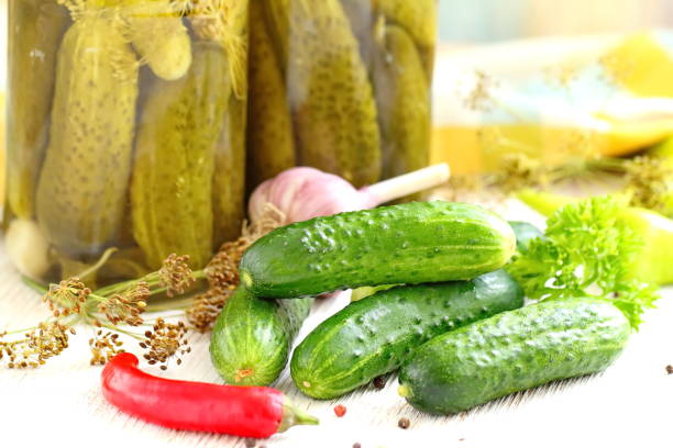 istock Homemade pickles in jar. Preserving pickled cucumbers. 1044711734