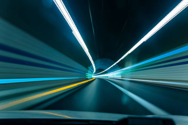 istock Driving on road tunnel 1044711766