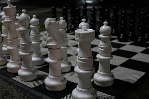 istock large white and black chess pieces z 1044712488