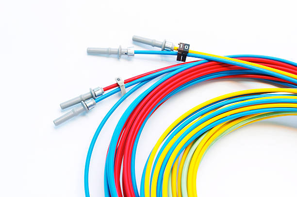 istock Colorful fiber optic cables against a white background 104471439