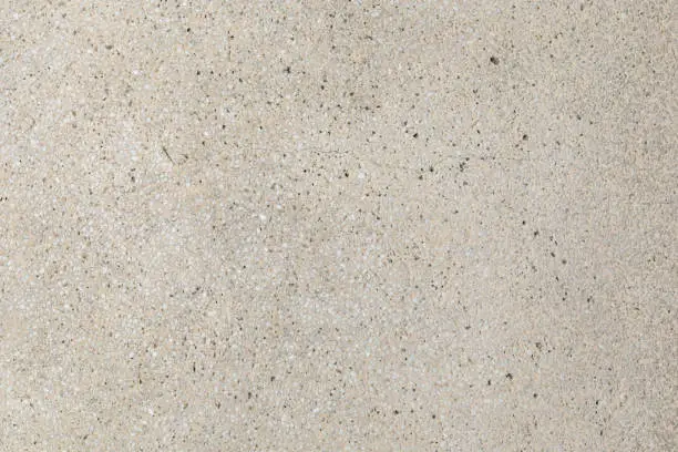 Photo of Cream aggregate concrete paving texture