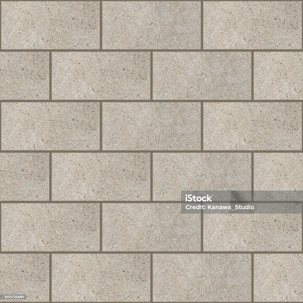 Seamless aggregate concrete pavers tile texture in cream Seamless Pattern Stock Photo