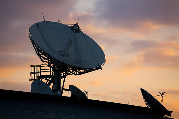 istock Satellite Dishes on Roof 1 104472587
