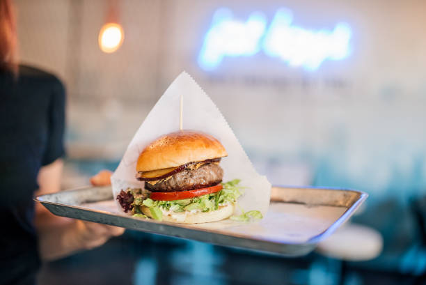istock Tasty burger in fastfood restaurant. 1044732638