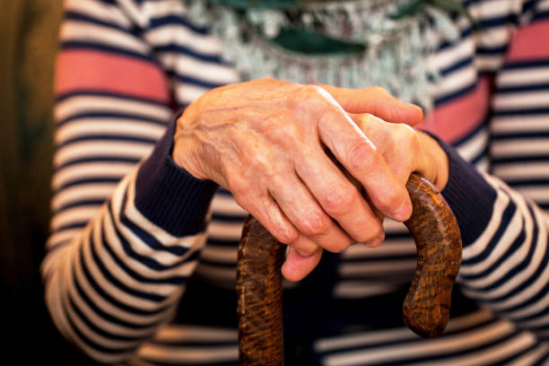 istock Close up of old woman hands 1044738440