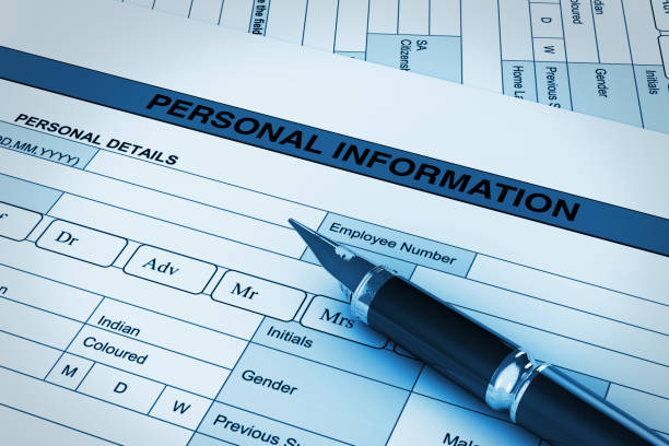 istock Golden Fountain Writing Pen on a Personal Information Forms in blue key. 3d Rendering 1044741804