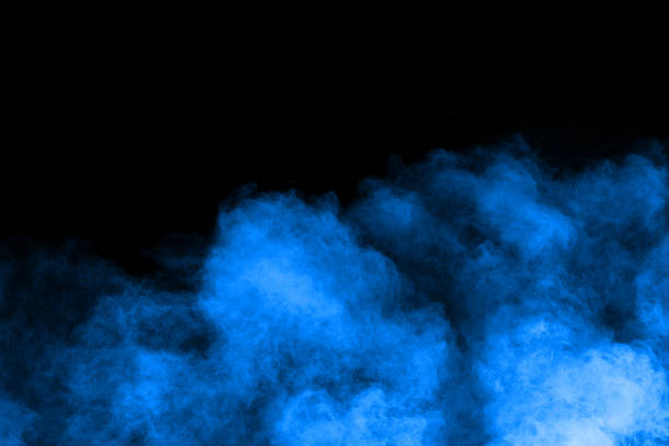 istock Blue powder explosion on black background. Colored cloud. Colorful dust explode. Paint Holi. 1044741862