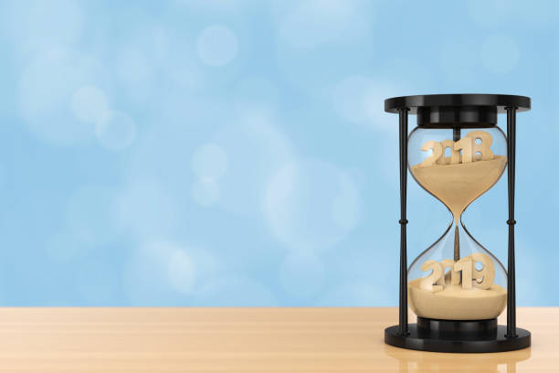 istock New 2019 Year Concept. Sand Falling in Hourglass Taking the Shape from 2018 to 2019. 3d Rendering 1044743566