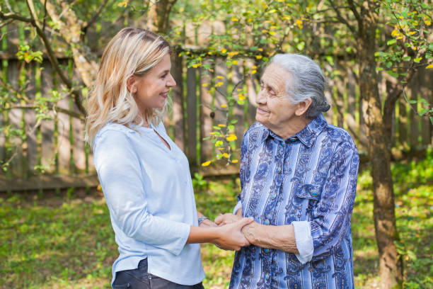 老婦人と歩いてください。 - grandmother senior adult smiling women ストックフォトと画像