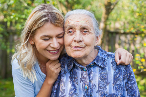 istock Woman embracing grandma 1044757190