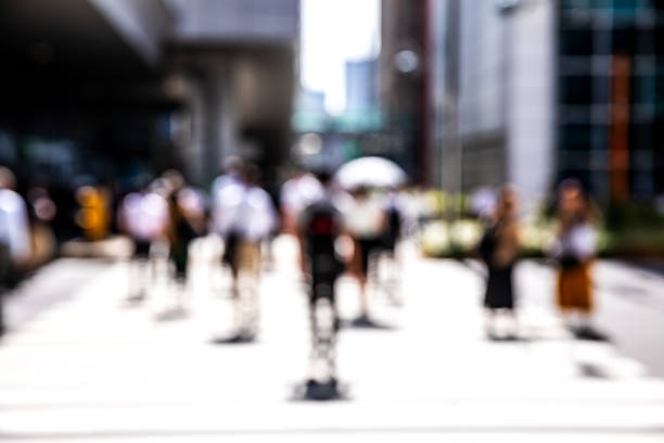 istock Busy crossing people in downtown 1044758330