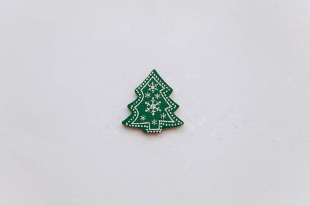 istock Small wooden Christmas tree on white background 1044758960