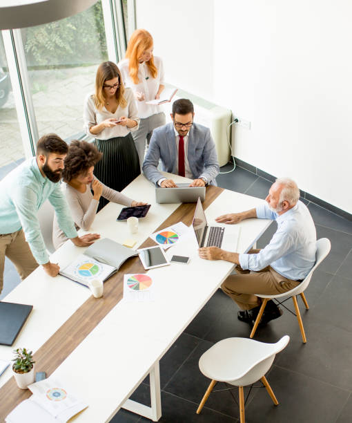 istock Top view at business people in office 1044767446
