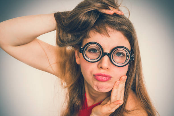 istock Funny nerd or geek woman with sexual expression on face 1044767560