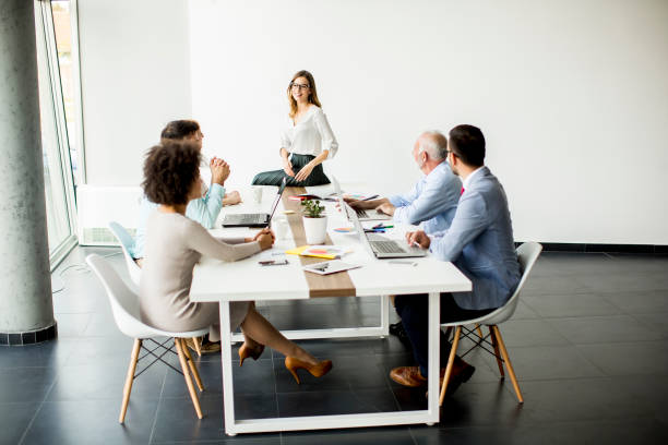 istock Joyful multiracial business team at work in modern office 1044767768