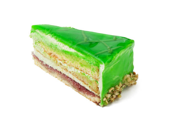 istock piece of kiwi cake isolated on white background 1044769334