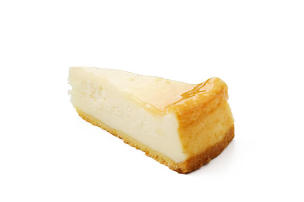 istock piece of cheesecake on white background isolated 1044769352