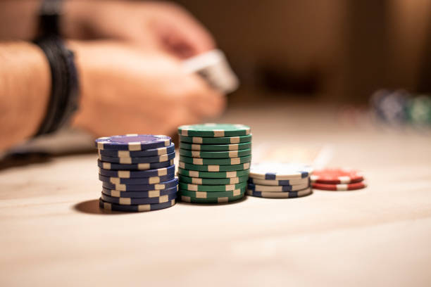 istock Croupier is distributing cards for playing. 1044771170
