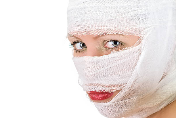 istock woman with bandages 104477292